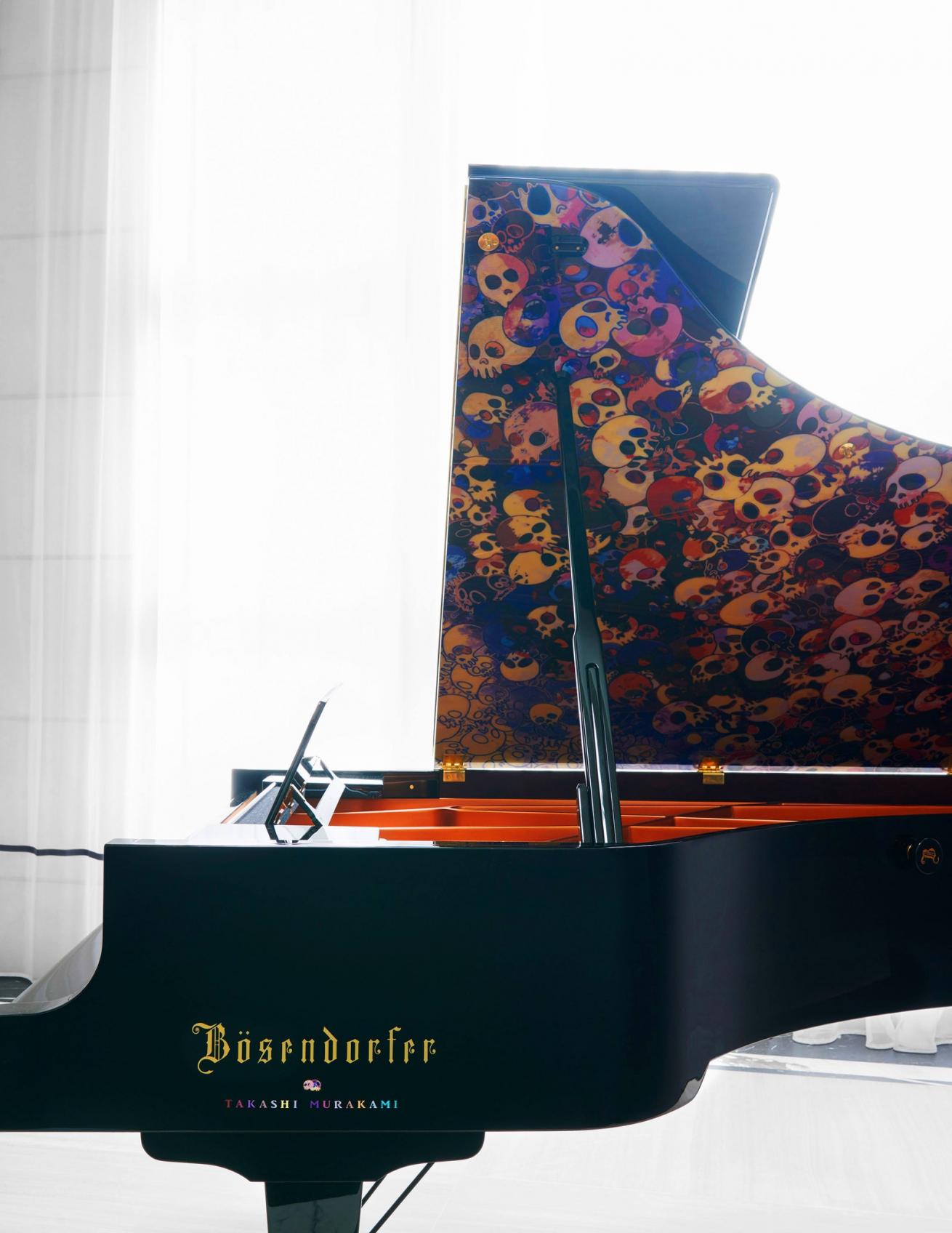A bespoke Bösendorfer concert grand piano designed by Ferris Rafauli and Takashi Murakami anchors the great room.