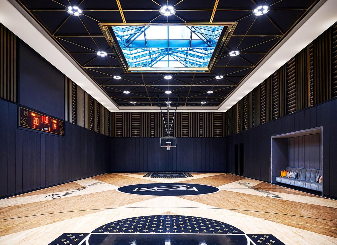 The official NBA-size court is painted with details inspired by Drake’s lifestyle brand, October’s Very Own.